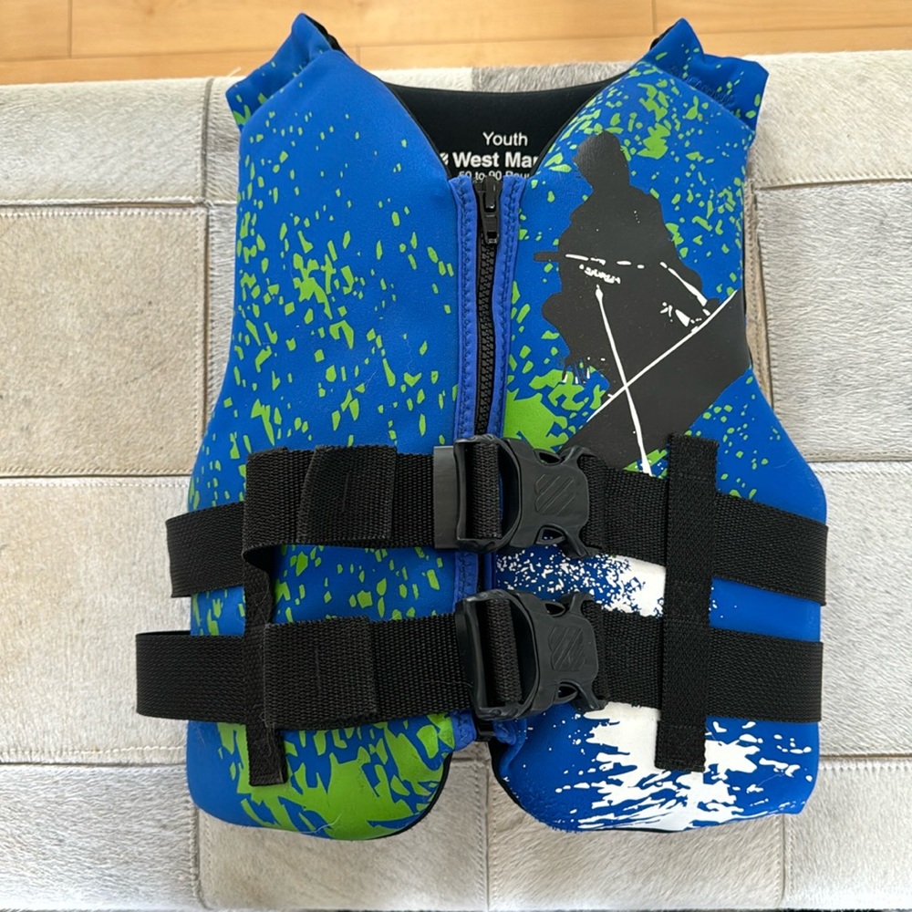 West marine life vest. Youth 50-90 pounds